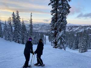 Two Female Skiers on slopes