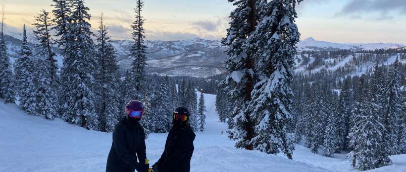 Two Female Skiers on slopes